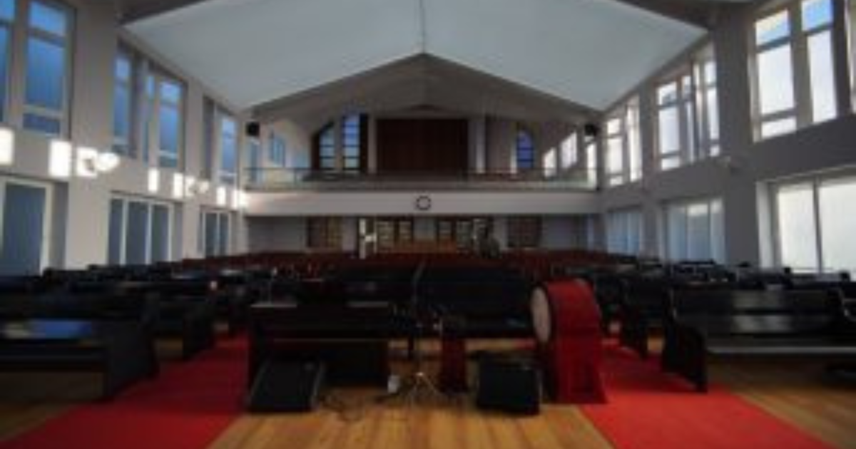 Spacious hall with large glass panels showcasing the best uPVC windows in Hyderabad